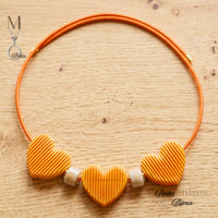 Collier aimanté cordon Orange
